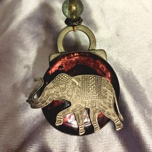 Long amethyst colored Stone pewter elephant necklace 30 inches or less